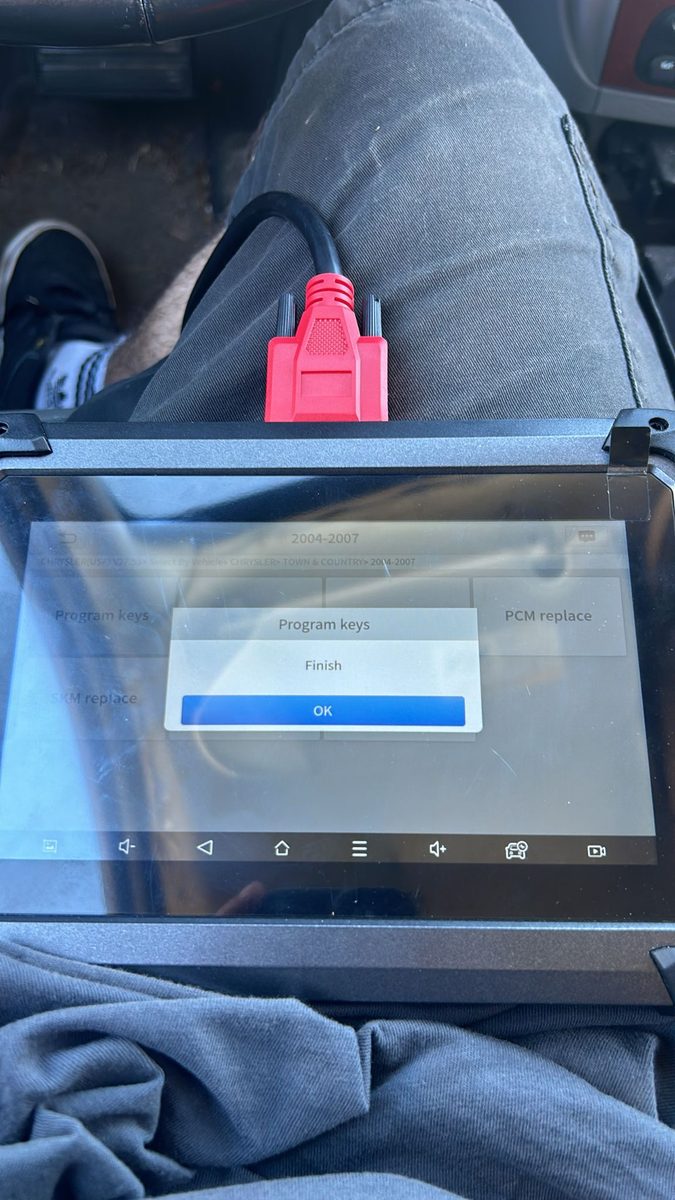 Locksmith programming car keys with diagnostic equipment