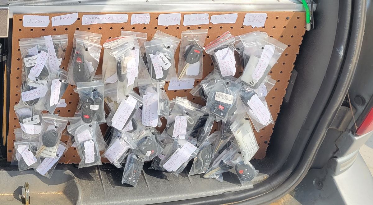 Mobile car key cutting and programming station in the service van