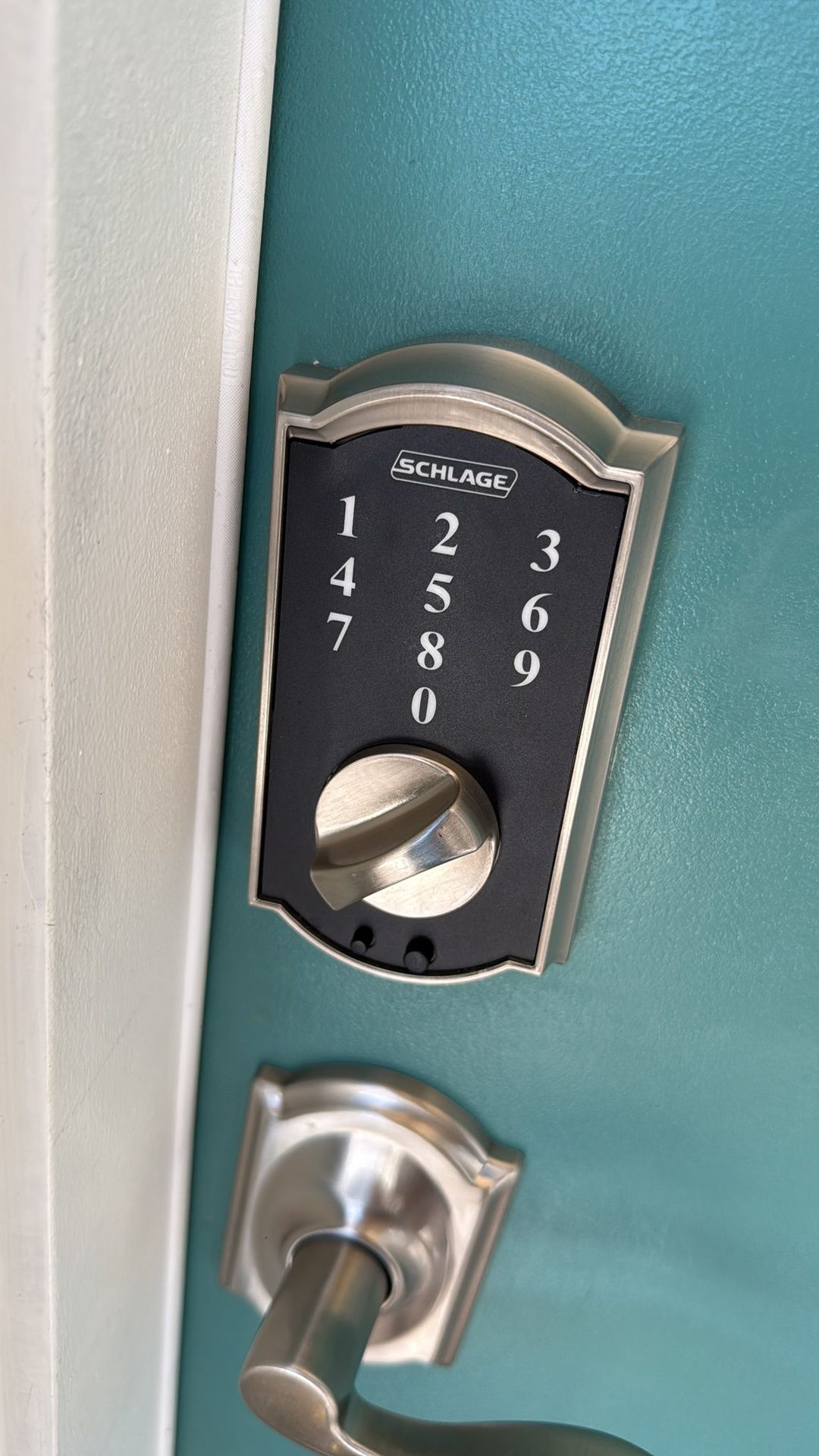 Locksmith opening a locked door during a lockout call in Jacksonville, FL