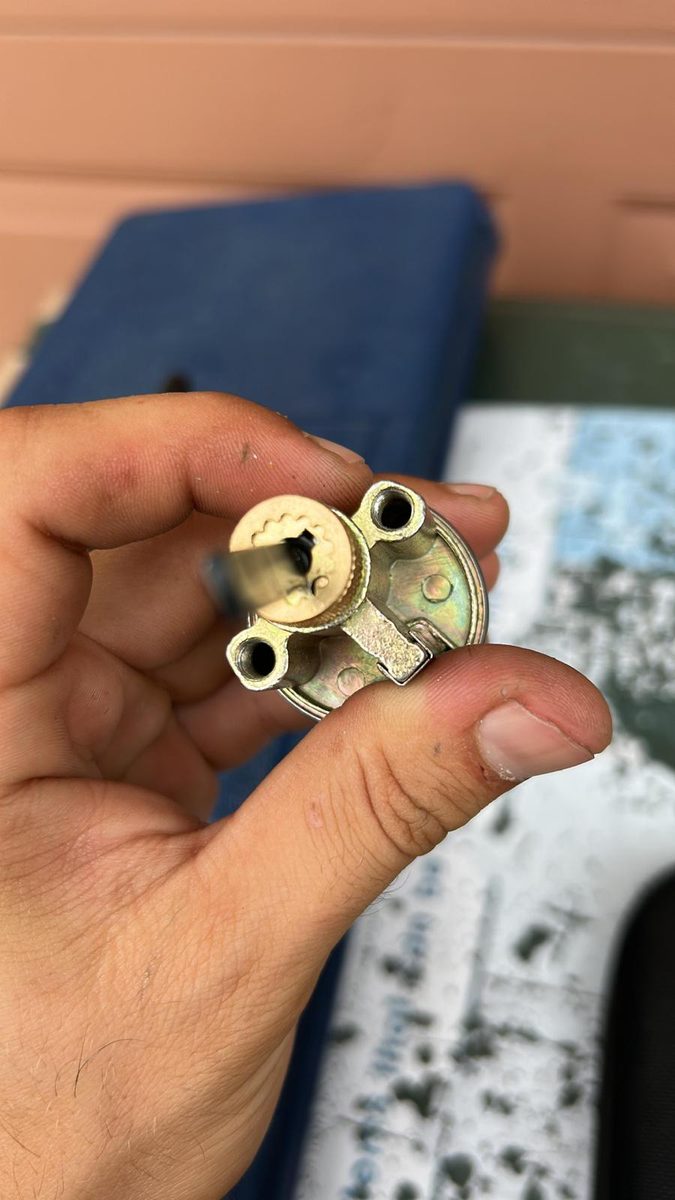 Locksmith rekeying a residential door lock in Jacksonville, FL