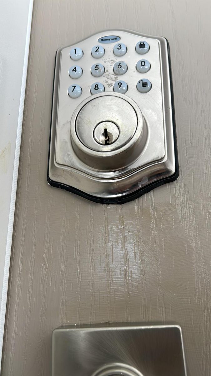 Smart lock installation on a Jacksonville home's front door